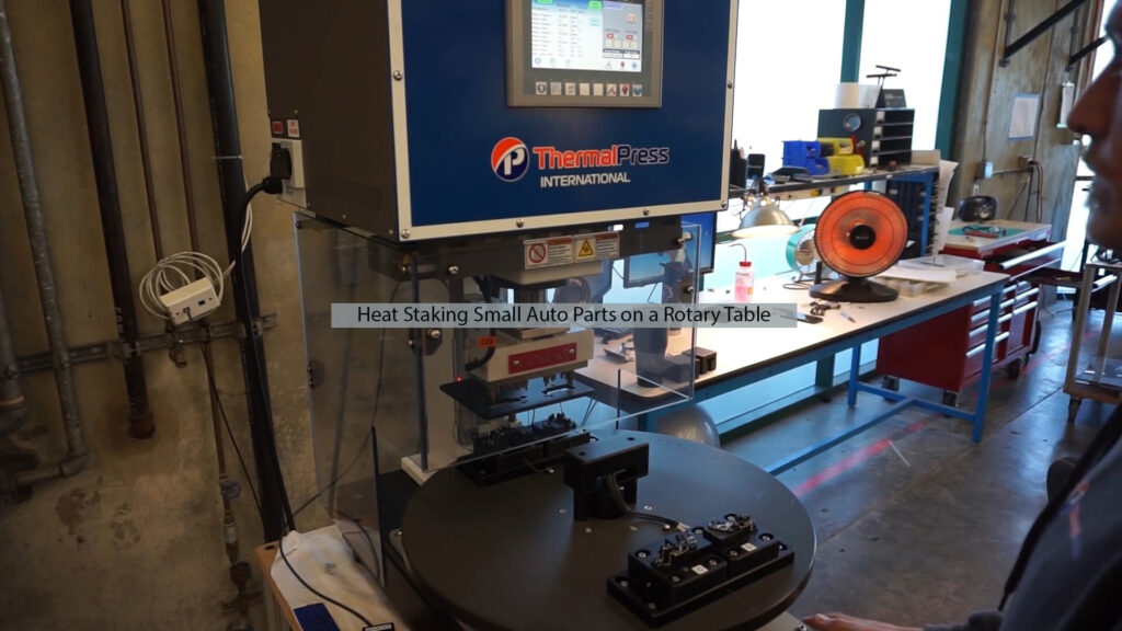 Heat staking small automotive parts on rotary table using Thermal Press machine